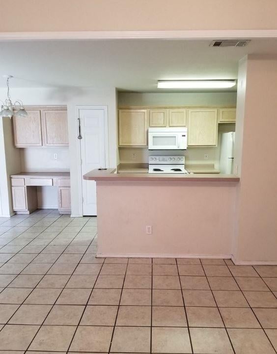 Kitchen at 819/821 Sagewood Trl - Hughson Heights Sec 03 C, San Marcos, TX
