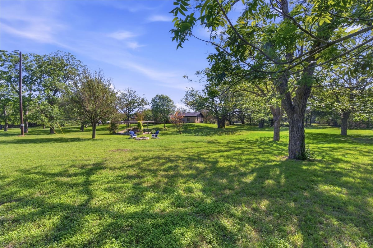 View 8203 N Madrone TRL in Bear Creek Oaks Sec 2 8203 N Madrone TRL - front exterior - Luxury home in Bear Creek Oaks Sec 2, Austin, TX
