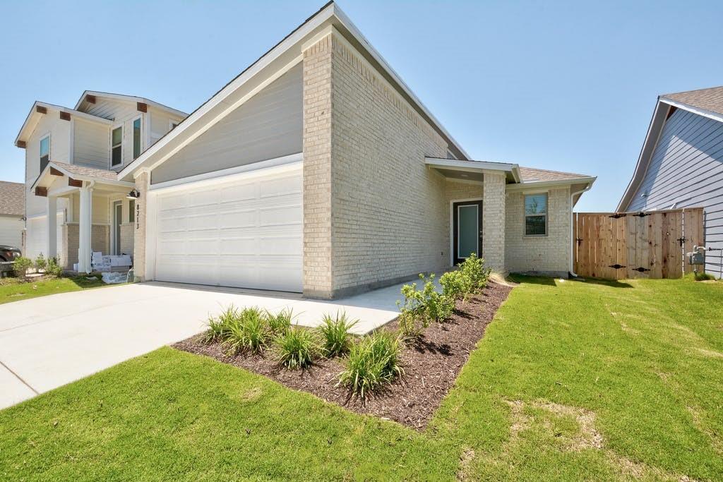 8213 Cottage Rose Dr - front exterior - Luxury home in Addison Sec 4, Austin, TX
