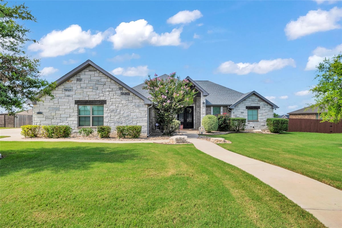 View 8219 Collins Creek Dr in Spring Crk 8219 Collins Creek Dr - front exterior - Luxury home in Spring Crk, Salado, TX