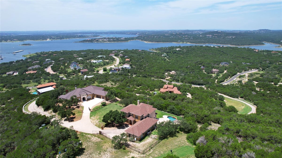 View 8293 Lime Creek Rd in Volente 8293 Lime Creek Rd - front exterior - Luxury home in Volente, Leander, TX