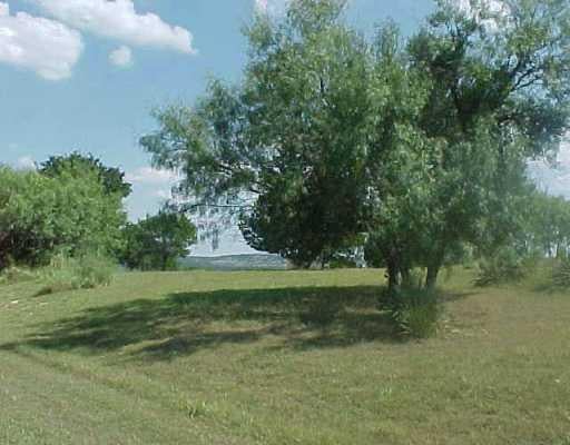 View 83 Wesley Ridge DR 83 Wesley Ridge DR - property photo 1 - Luxury lot in Spicewood, TX