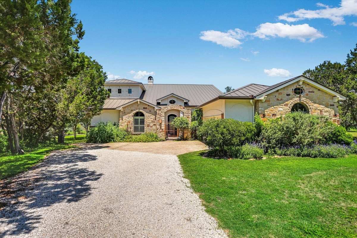 View 831 Southriver RD in South River Unit 1 831 Southriver RD - front exterior - Luxury home in South River Unit 1, Wimberley, TX