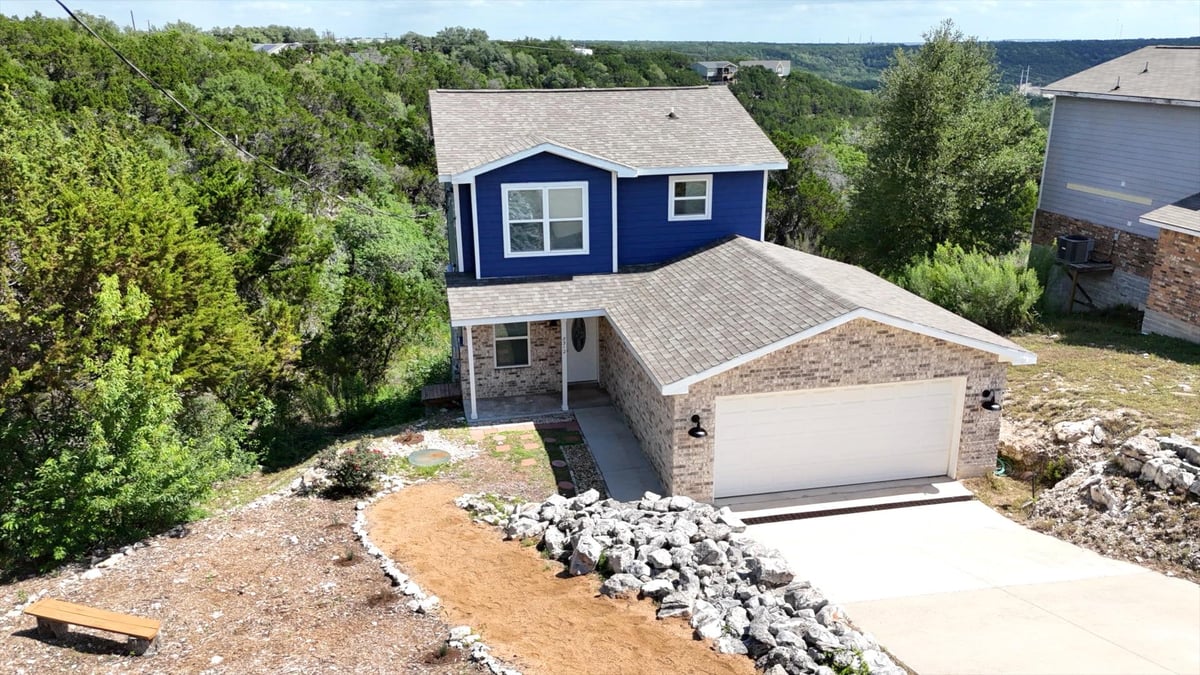 View 8312 S Timber TRL in Bar-K Ranches 16 8312 S Timber TRL - front exterior - Luxury home in Bar-K Ranches 16, Lago Vista, TX