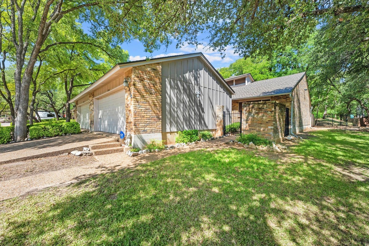 View 8318 Bent Tree RD in Summer Wood 8318 Bent Tree RD - front exterior - Luxury home in Summer Wood, Austin, TX