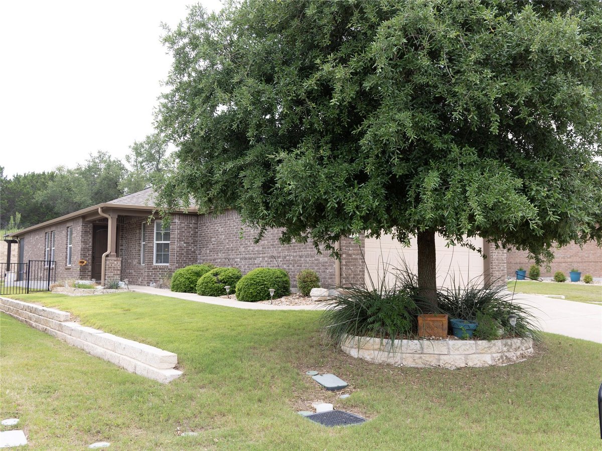 View 834 Salado Creek Ln in Sun City 834 Salado Creek Ln - front exterior - Luxury home in Sun City, Georgetown, TX