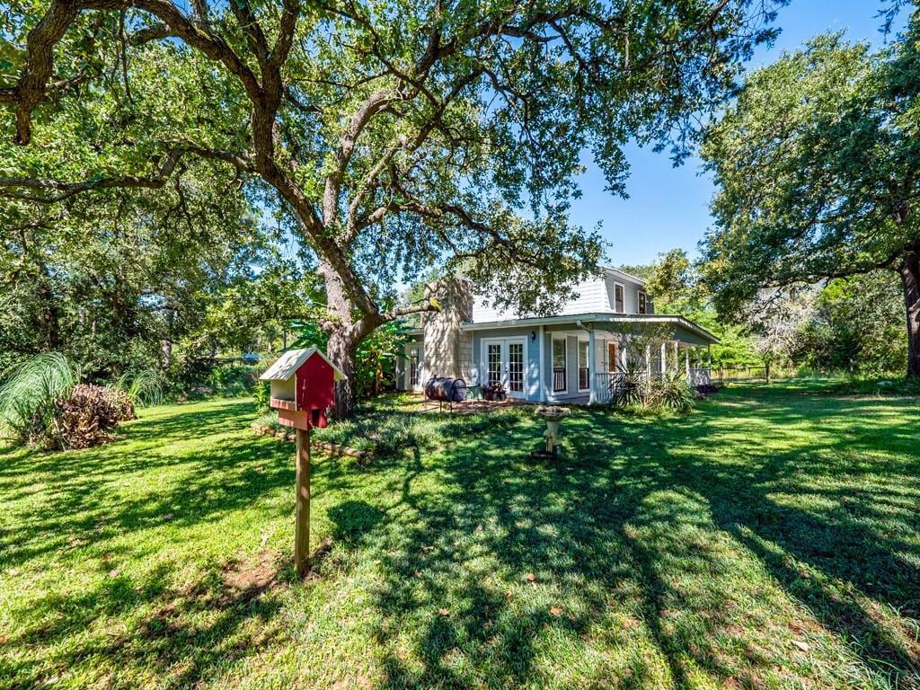 View 836 Cottle Town RD in Drumgoole, Thomas 836 Cottle Town RD - property photo 1 - Luxury home in Drumgoole, Thomas, Smithville, TX