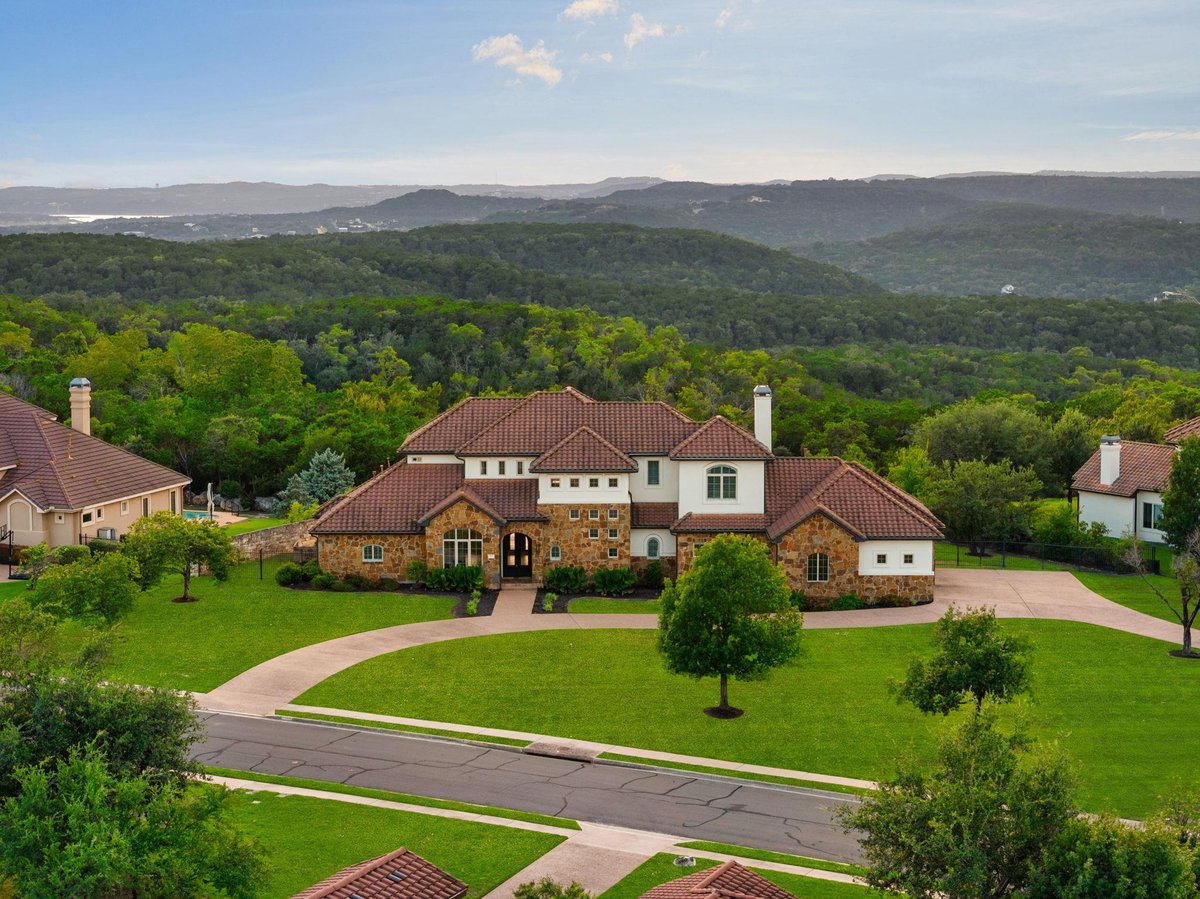 View 8400 Denali Pkwy in Grandview Hills Sec 08 8400 Denali Pkwy - front exterior - Luxury home in Grandview Hills Sec 08, Austin, TX