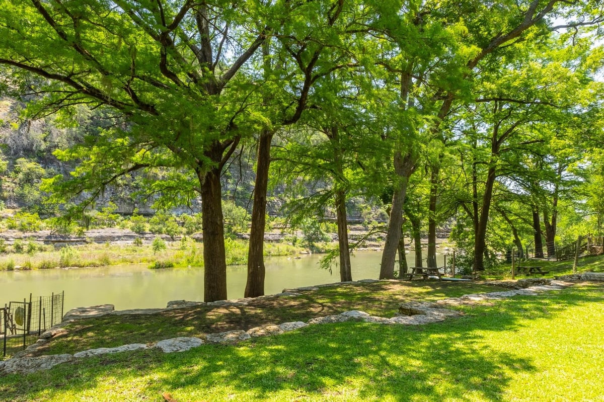 View 8560 RIVER RD Rd in SCENIC VALLEY 8560 RIVER RD Rd - front exterior - Luxury lot in SCENIC VALLEY, New Braunfels, TX