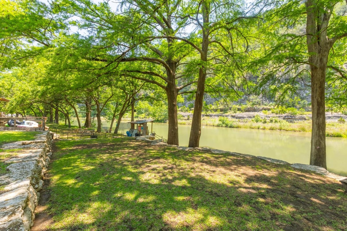 Primary bedroom at 8560 RIVER RD Rd - SCENIC VALLEY, New Braunfels, TX