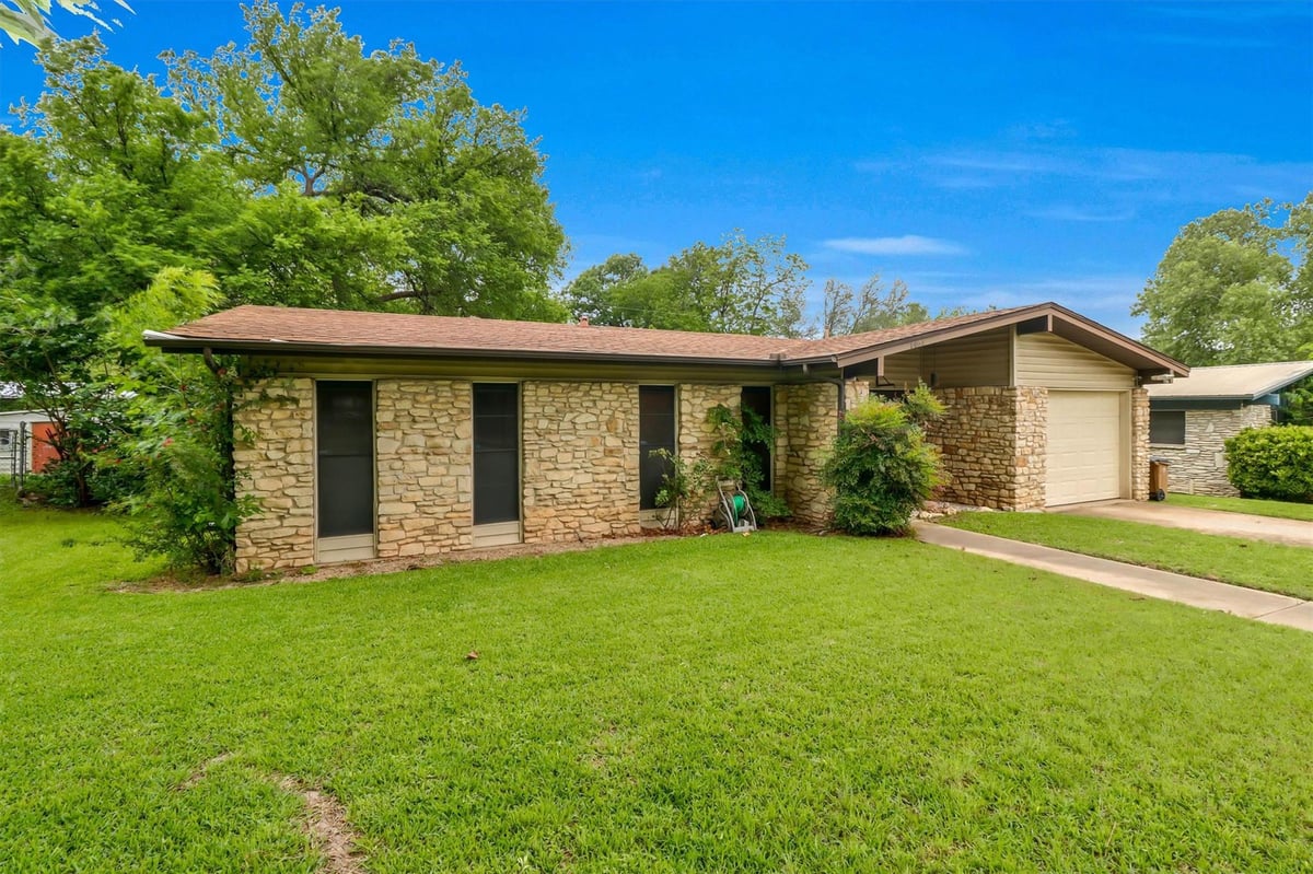 View 8604 Parkfield DR in Wooten Village Sec 02 8604 Parkfield DR - property photo 1 - Luxury home in Wooten Village Sec 02, Austin, TX