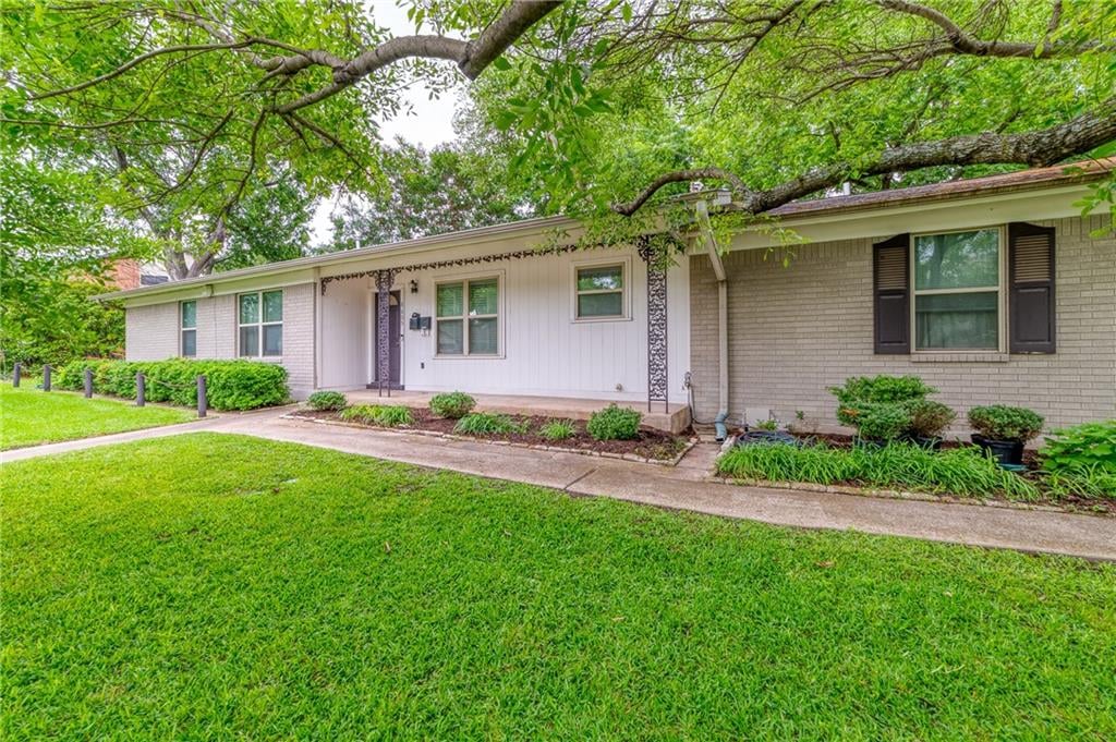 View 8605 Rockwood Ln in Roe Add 8605 Rockwood Ln - front exterior - Luxury home in Roe Add, Austin, TX