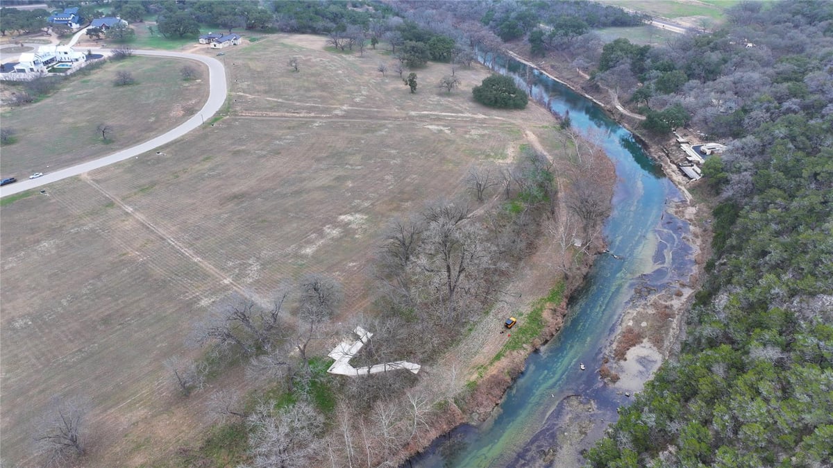 View 861 Bingham Ln in OXBOW ON THE GUADALUPE 861 Bingham Ln - property photo 1 - Luxury lot in OXBOW ON THE GUADALUPE, New Braunfels, TX