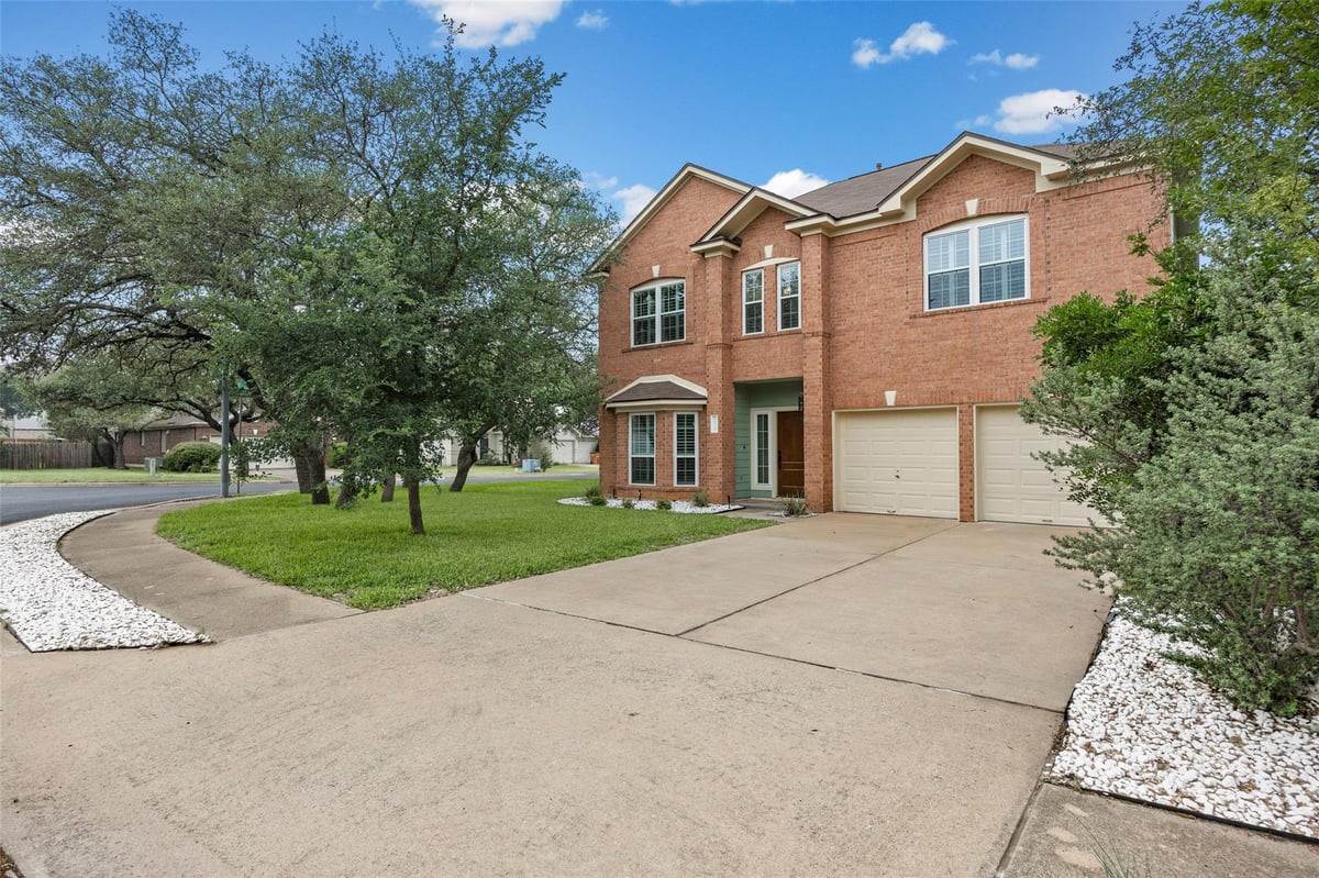 View 8610 Axis Dr in Deer Park At Maple Run Sec 10 8610 Axis Dr - front exterior - Luxury home in Deer Park At Maple Run Sec 10, Austin, TX