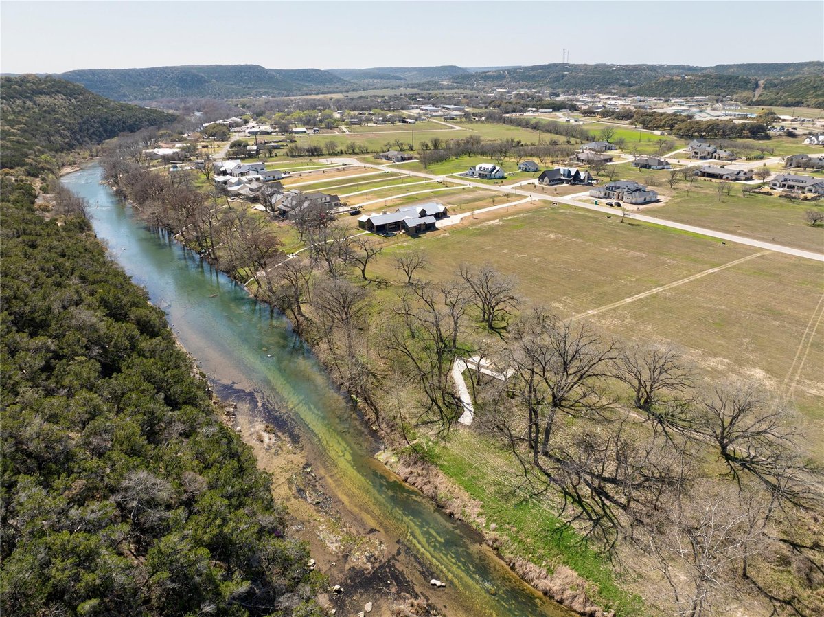 Primary bedroom at 865 Bingham Ln - OXBOW ON THE GUADALUPE, New Braunfels, TX