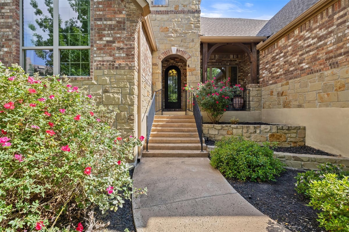 View 8700 Flycatcher Ct in Rocky Creek Ranch 8700 Flycatcher Ct - front exterior - Luxury home in Rocky Creek Ranch, Austin, TX