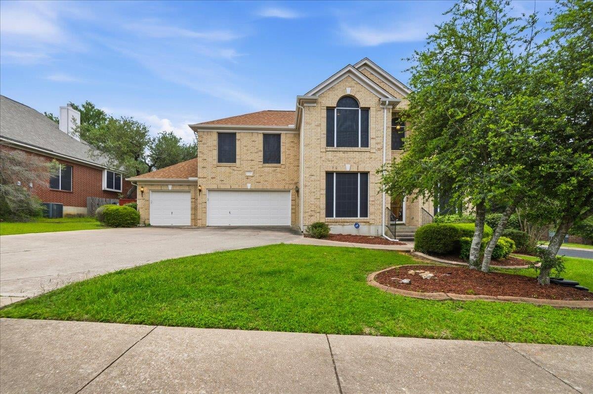 View 8700 Wafer Ash Way in Bluffs Sec 1 At The Villages O 8700 Wafer Ash Way - front exterior - Luxury home in Bluffs Sec 1 At The Villages O, Austin, TX