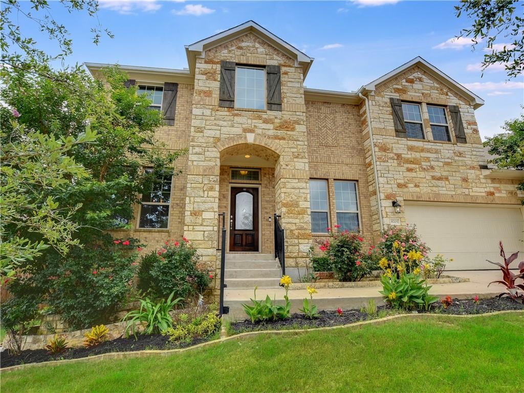 8705 Old Corral Cv - front exterior - Luxury home in Ridgeview Ph 1, Austin, TX
