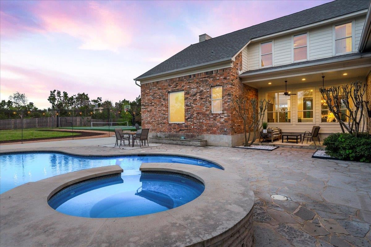 View 8706 Bell Mountain Dr in Long Canyon 02-A 8706 Bell Mountain Dr - front exterior - Luxury home in Long Canyon 02-A, Austin, TX