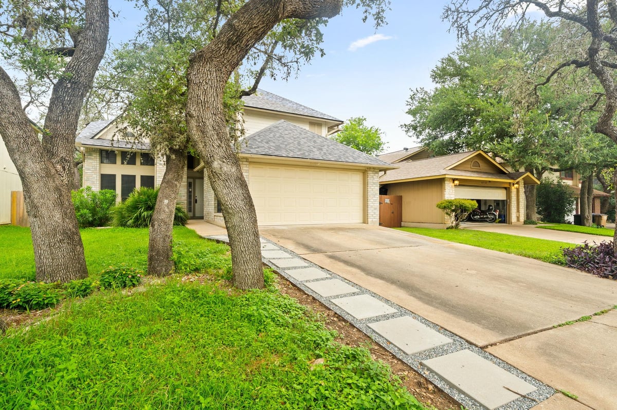 View 8712 Coastal DR in Maple Run Sec 08 8712 Coastal DR - front exterior - Luxury home in Maple Run Sec 08, Austin, TX