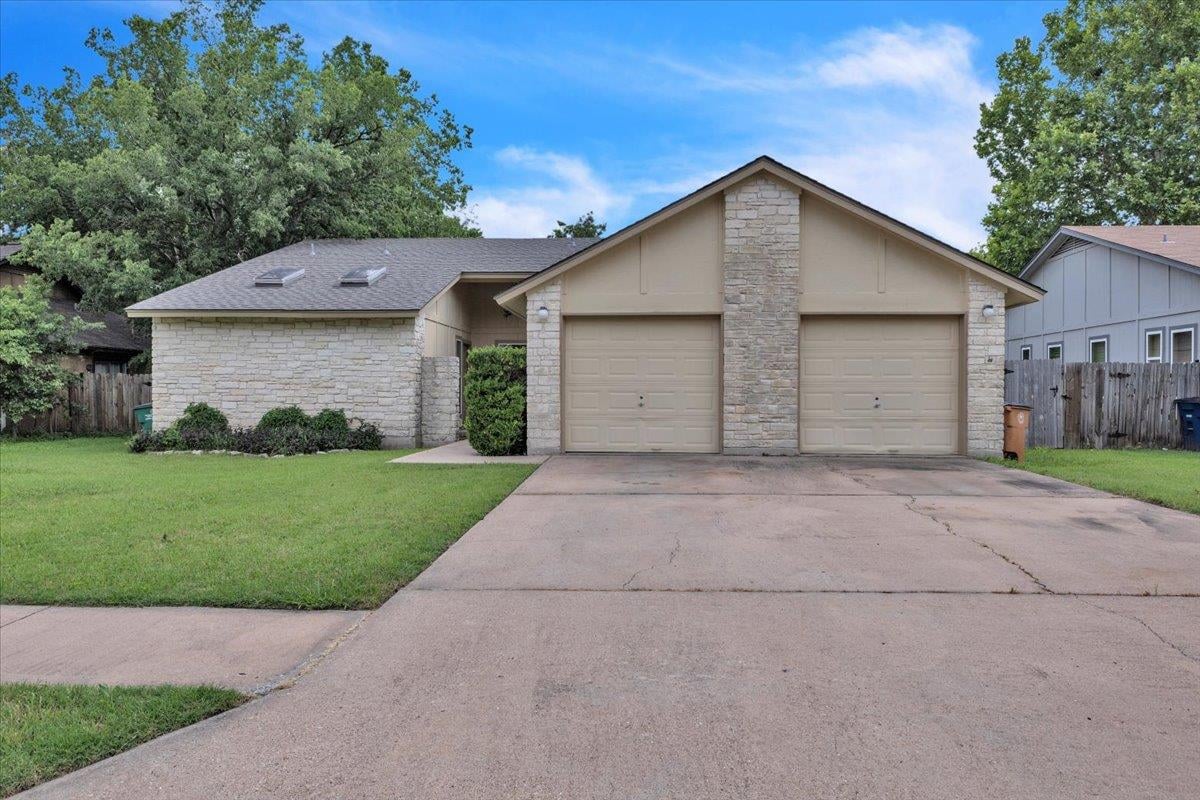 View 8713 Pineridge DR in Springwoods Sec 01-A 8713 Pineridge DR - front exterior - Luxury home in Springwoods Sec 01-A, Austin, TX