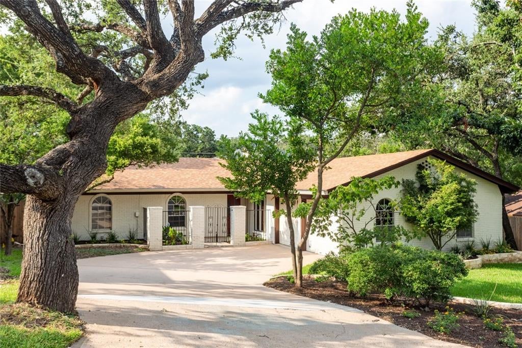 View 8720 Tallwood Dr in Westover Hills 8720 Tallwood Dr - front exterior - Luxury home in Westover Hills, Austin, TX
