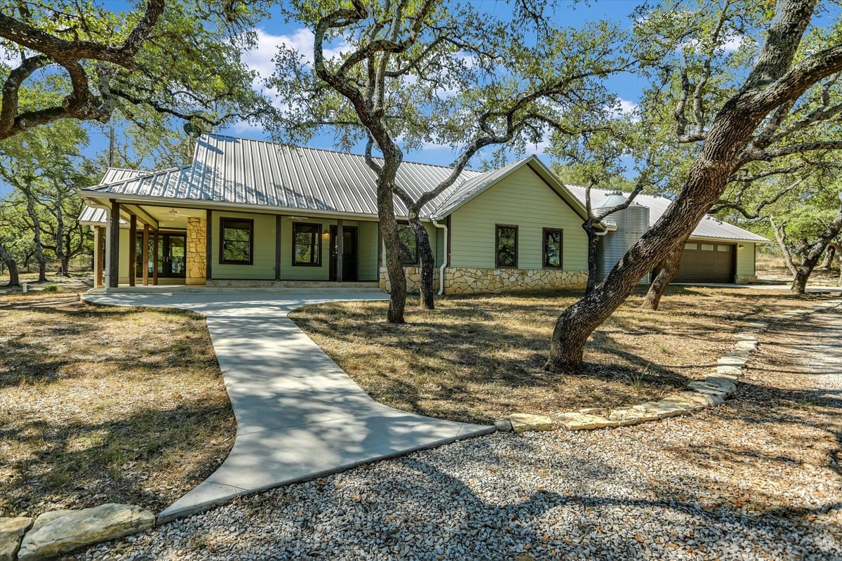 View 878 Ranch Road 2766 in see legal description 878 Ranch Road 2766 - front exterior - Luxury home in see legal description, Johnson City, TX