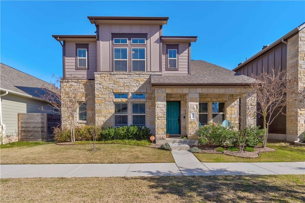 View 8801 Slater Dr in Goodnight Ranch Ph 1 Sec 2 8801 Slater Dr - front exterior - Luxury home in Goodnight Ranch Ph 1 Sec 2, Austin, TX