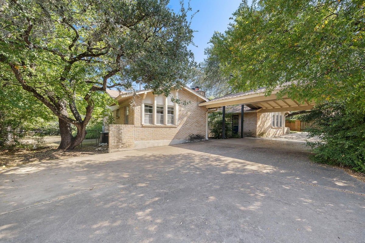 View 8802 Westover Club Dr in Westover Hills Club Estates SE 8802 Westover Club Dr - front exterior - Luxury home in Westover Hills Club Estates SE, Austin, TX