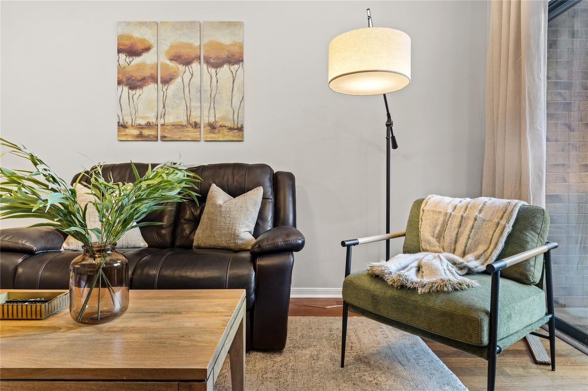 Living area at 8888 Tallwood Dr Unit #1107 - 1 bed 1 bath home