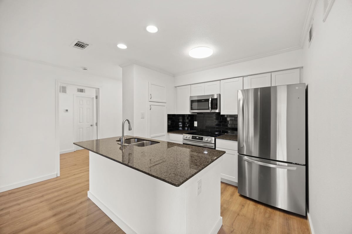 Primary bedroom at 8888 Tallwood Dr Unit #1202 - 2 bed 2 bath home