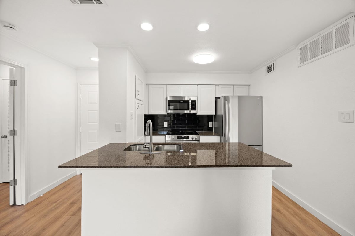 Bathroom at 8888 Tallwood Dr Unit #1202 - 2 bed 2 bath home