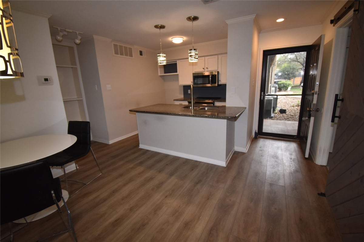 Bathroom at 8888 Tallwood Dr Unit #2109 - 2 bed 2 bath home