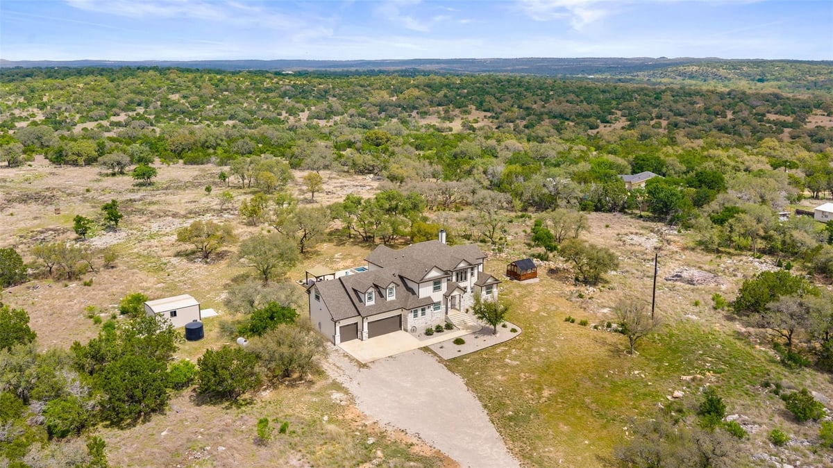 View 889 Brock Hollow Dr in Pedernales Bend 889 Brock Hollow Dr - front exterior - Luxury home in Pedernales Bend, Johnson City, TX