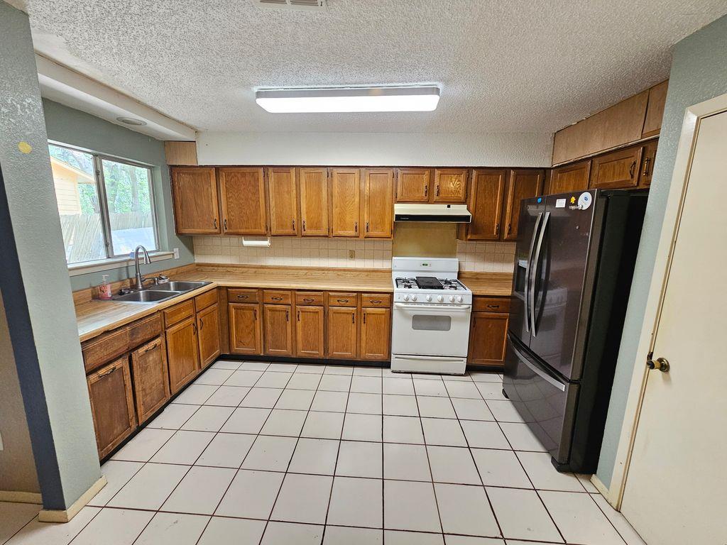 Kitchen at 8909 Texas Sun Dr - 3 bed 2 bath home