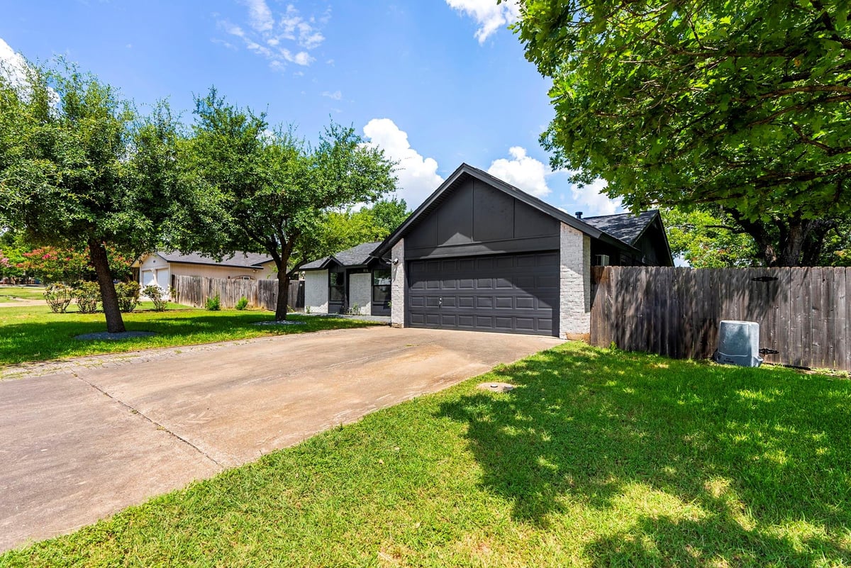 View 8910 Sparkling Creek Dr in Springwoods Sec 01 8910 Sparkling Creek Dr - front exterior - Luxury home in Springwoods Sec 01, Austin, TX