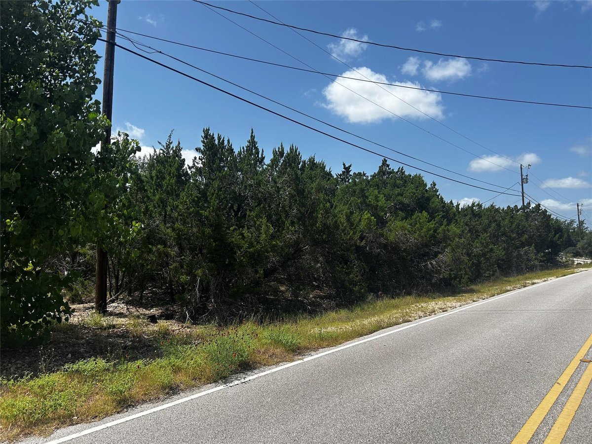 View 8911 Bar K Ranch RD in Bar-K Ranches 8911 Bar K Ranch RD - property photo 1 - Luxury lot in Bar-K Ranches, Lago Vista, TX