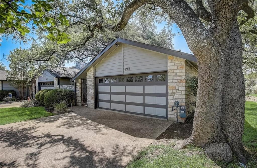 View 8917 Mount Bartlett Dr in Bluffs Great Hills 8917 Mount Bartlett Dr - front exterior - Luxury home in Bluffs Great Hills, Austin, TX