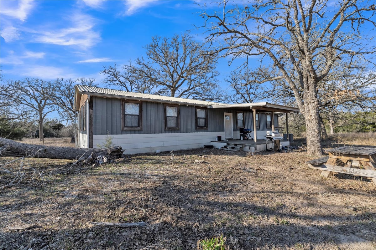 View 895 Patterson Rd in MILLETT, SAMUEL 895 Patterson Rd - front exterior - Luxury home in MILLETT, SAMUEL, Flatonia, TX