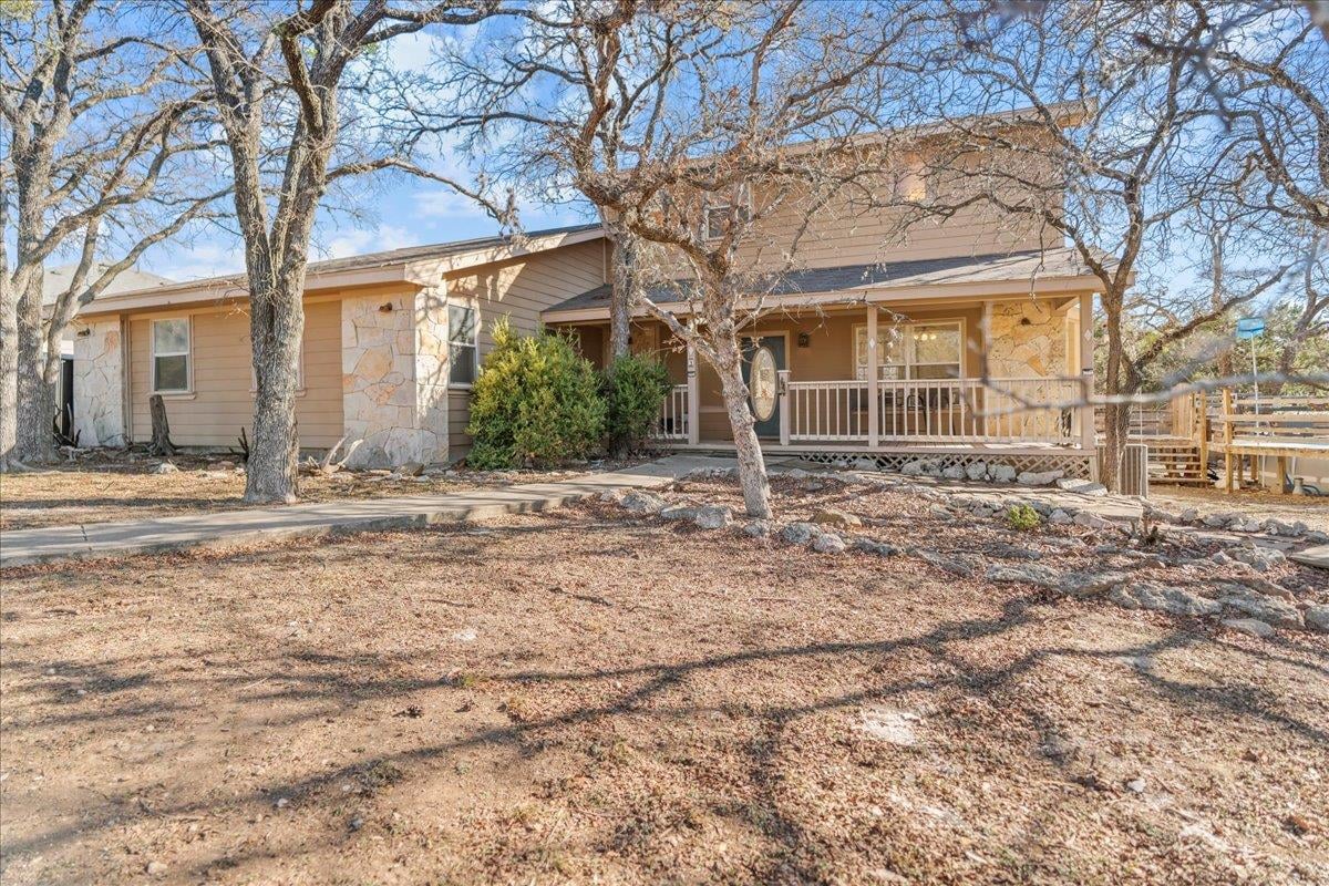 View 9 Ridgewood Cir in Woodcreek Sec 20 9 Ridgewood Cir - front exterior - Luxury home in Woodcreek Sec 20, Wimberley, TX
