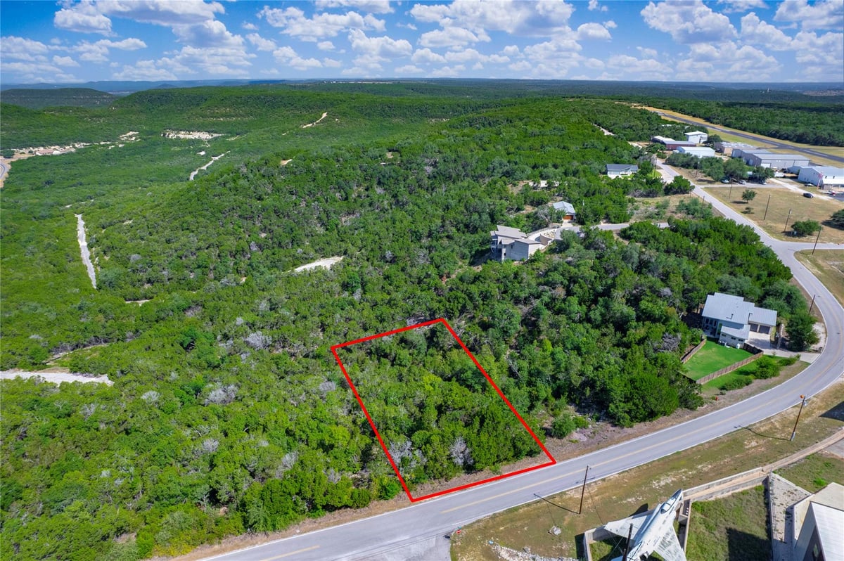 View 9000 Bar K Ranch RD in Bar-K Ranches 11 9000 Bar K Ranch RD - property photo 1 - Luxury lot in Bar-K Ranches 11, Lago Vista, TX
