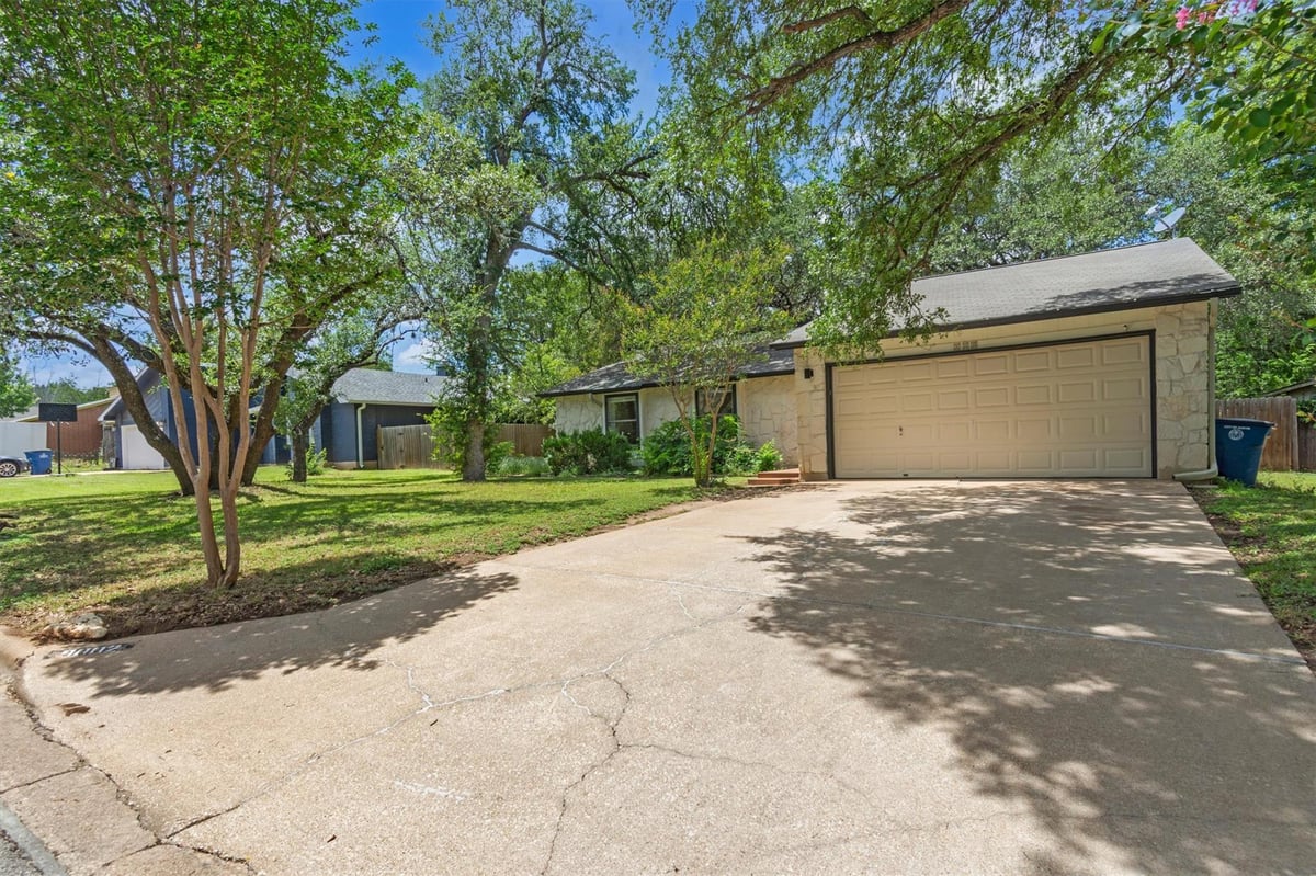 9002 Bubbling Springs TRL - front exterior - Luxury home in Springwoods Sec 01, Austin, TX