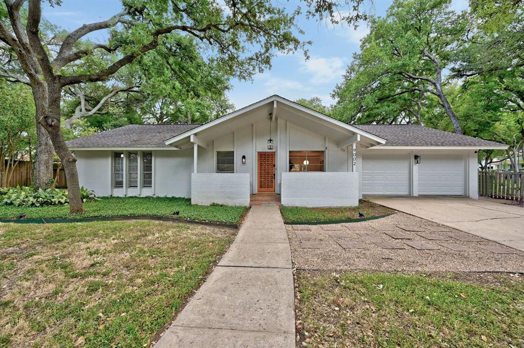 View 9002 Collingwood Dr in Castlewood Forest Sec 06 9002 Collingwood Dr - front exterior - Luxury home in Castlewood Forest Sec 06, Austin, TX