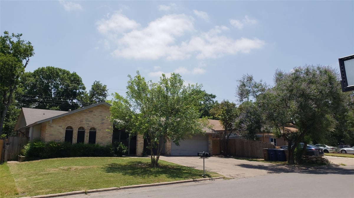 View 9007 Quail Valley Dr in Quail Creek Ph 02 Sec 02 9007 Quail Valley Dr - front exterior - Luxury home in Quail Creek Ph 02 Sec 02, Austin, TX