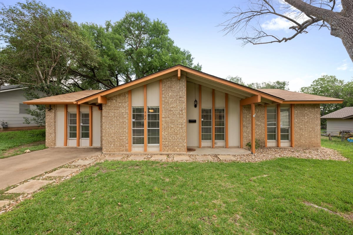 View 902 Emerald Wood Dr in Emerald Forest Sec 03 902 Emerald Wood Dr - front exterior - Luxury home in Emerald Forest Sec 03, Austin, TX