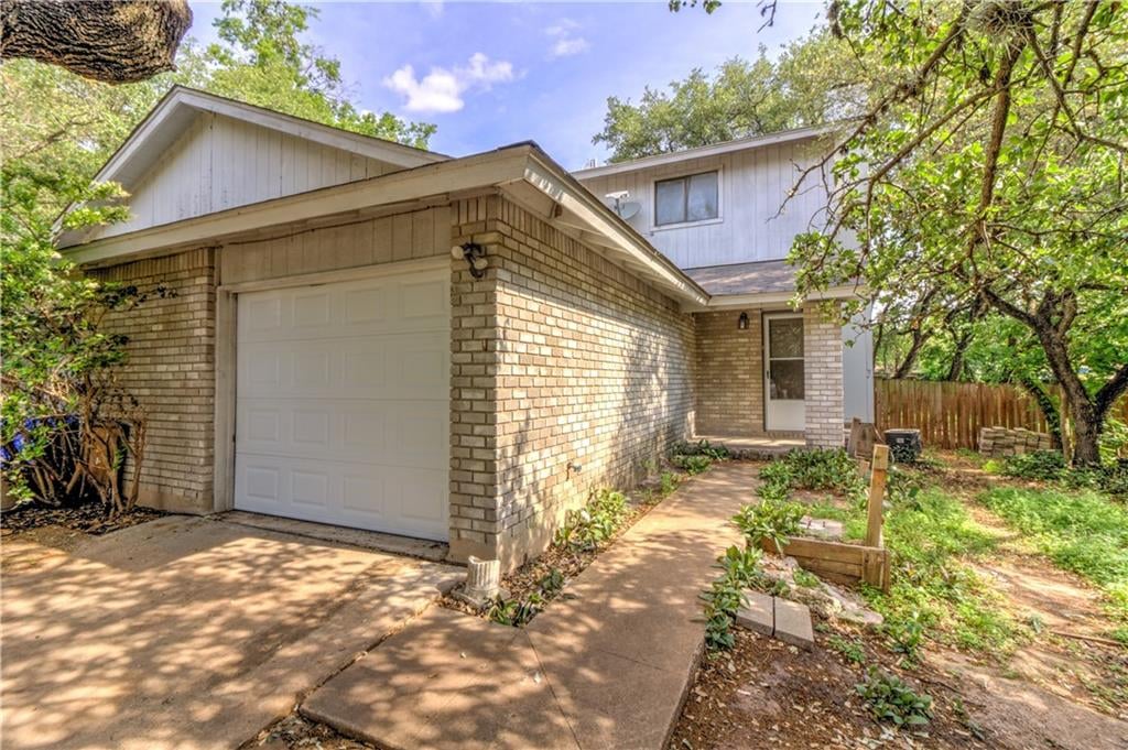 View 9024 Sawtooth Ln in Springwoods Sec 01 9024 Sawtooth Ln - front exterior - Luxury home in Springwoods Sec 01, Austin, TX