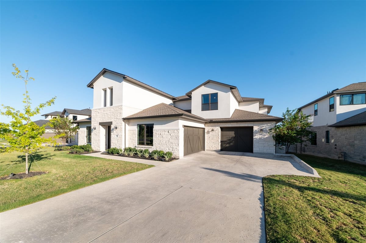View 903 Tomichi TRL in Lakeway Hlnds Ph 3 Sec 6B 903 Tomichi TRL - front exterior - Luxury home in Lakeway Hlnds Ph 3 Sec 6B, Austin, TX