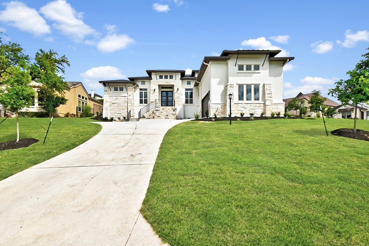 View 905 CRESTONE STREAM Dr in Serene Hills Sub Ph 2E; LAKEWAY 905 CRESTONE STREAM Dr - front exterior - Luxury home in Serene Hills Sub Ph 2E; LAKEWAY, Austin, TX