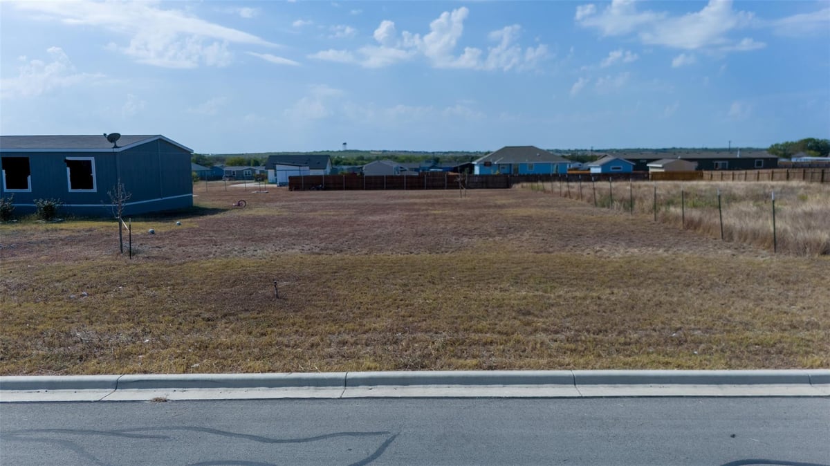 View 905 Rustler Pass in Las Estancias 2 Sub 905 Rustler Pass - property photo 1 - Luxury lot in Las Estancias 2 Sub, Kyle, TX