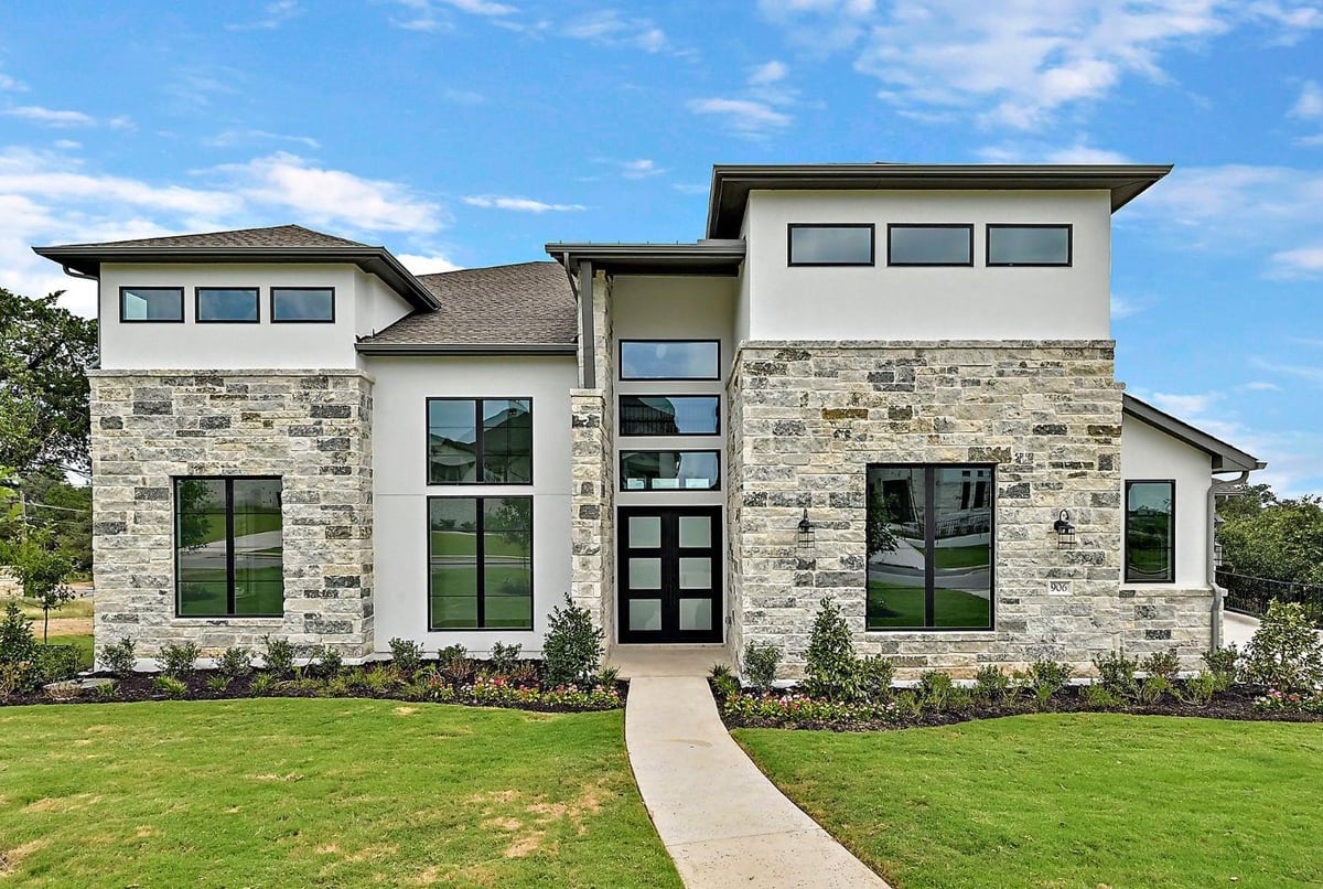 View 906 Bristol Creek BND in Rough Hollow 906 Bristol Creek BND - front exterior - Luxury home in Rough Hollow, Lakeway, TX